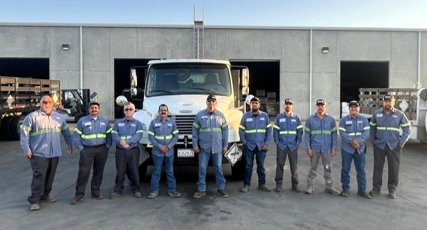 GAR's drivers and delivery team in front of a delivery truck at the Reedley yard